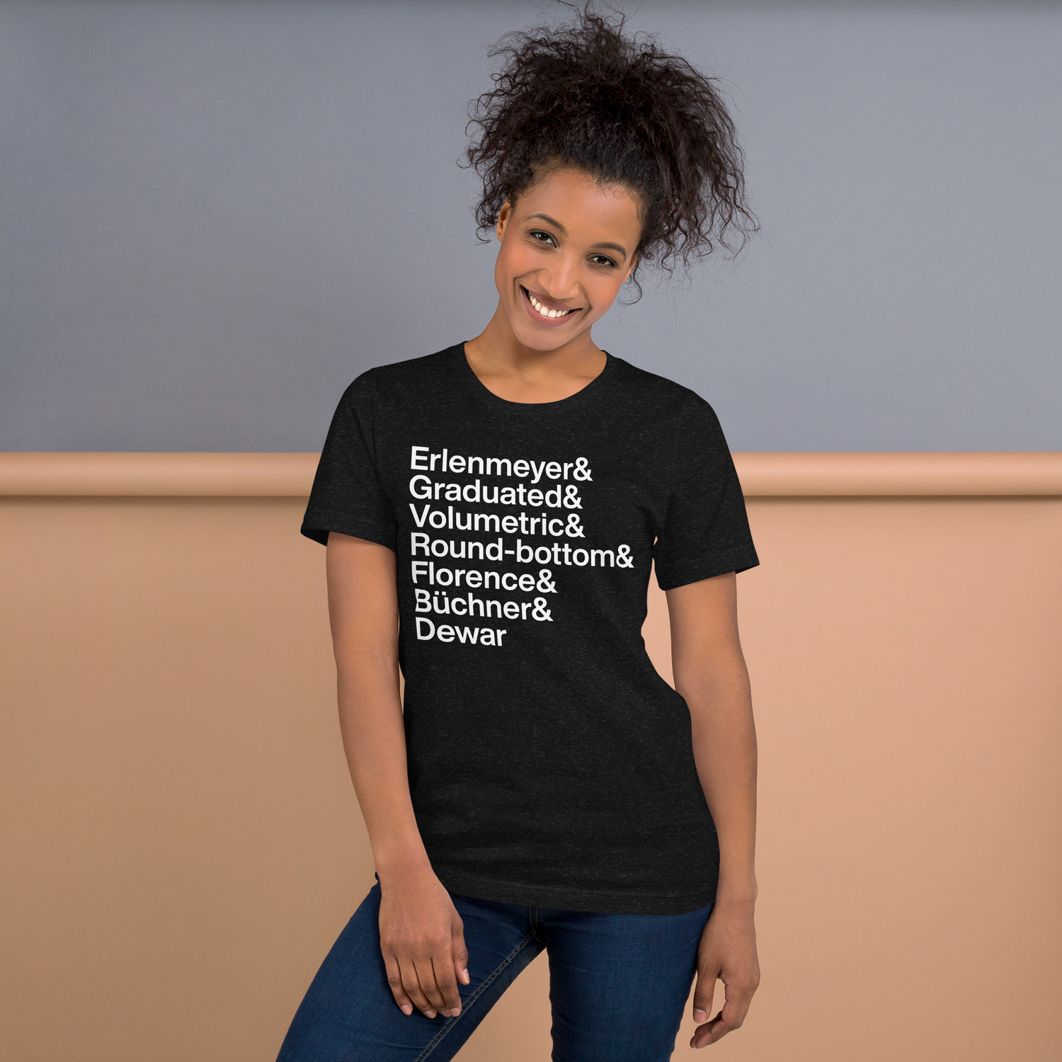 Woman with AmpTee t-shirt that has famous types of scientific flasks