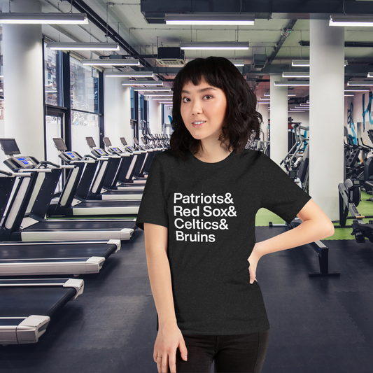 Young woman by treadmills wearing t-shirt which reads Patriots and Red Sox and Celtics and Bruins in white letters