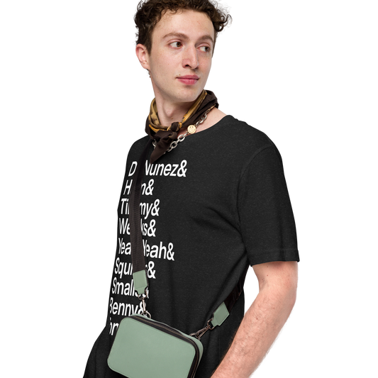 Young man in handkerchief wearing a black t-shirt with white lettering depicting the characters of the Sandlot