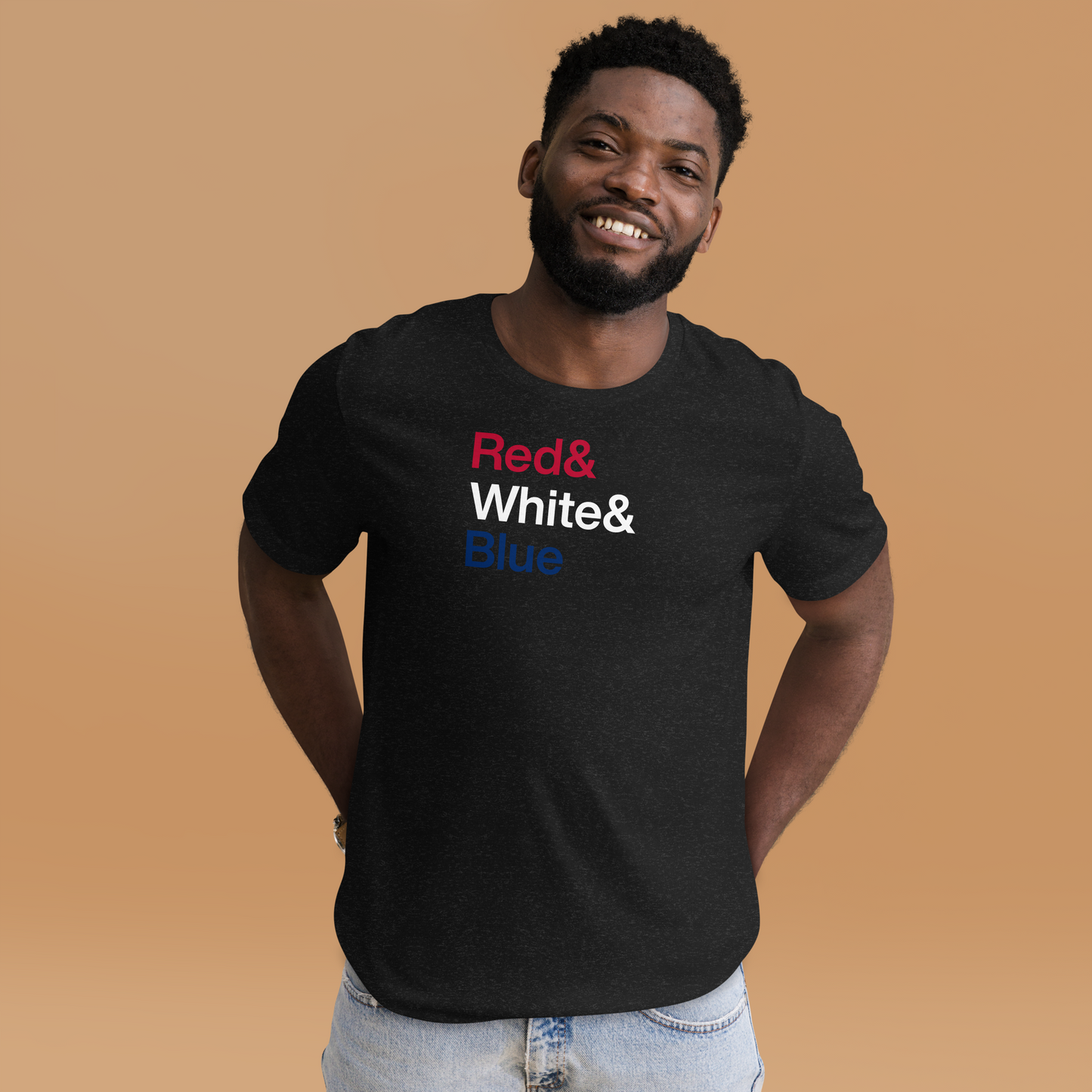 Young man wearing black t-shirt with letters reading Red and White and Blue