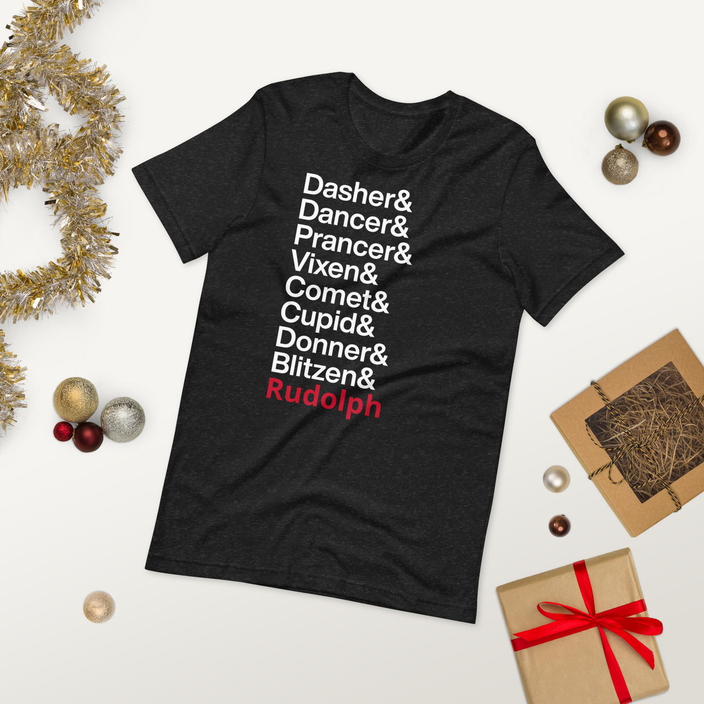 black tshirt with text reading "dasher and Dancer and Prancer and Vixen and Comet and Cupid and Donner and Blitzen and Rudolph" amidst other holiday items