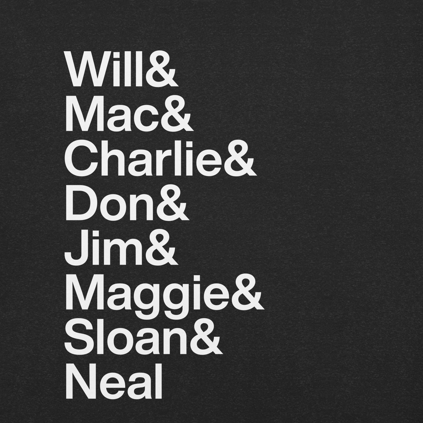 Close up of a black t-shirt with white lettering depicting characters of The Newsroom