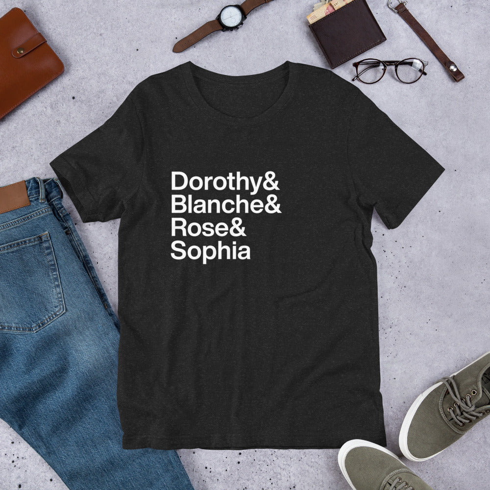 black t-shirt with white lettering reading Dorothy and Blanche and Rose and Sophia on ground with other apparel