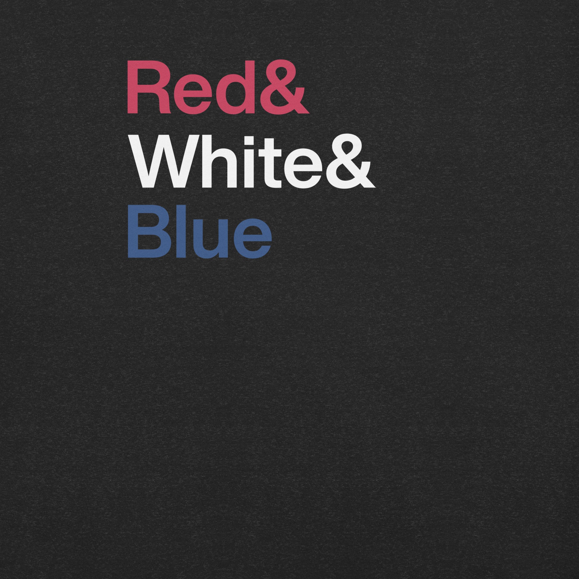 Close up of black t-shirt with letters reading Red and White and Blue