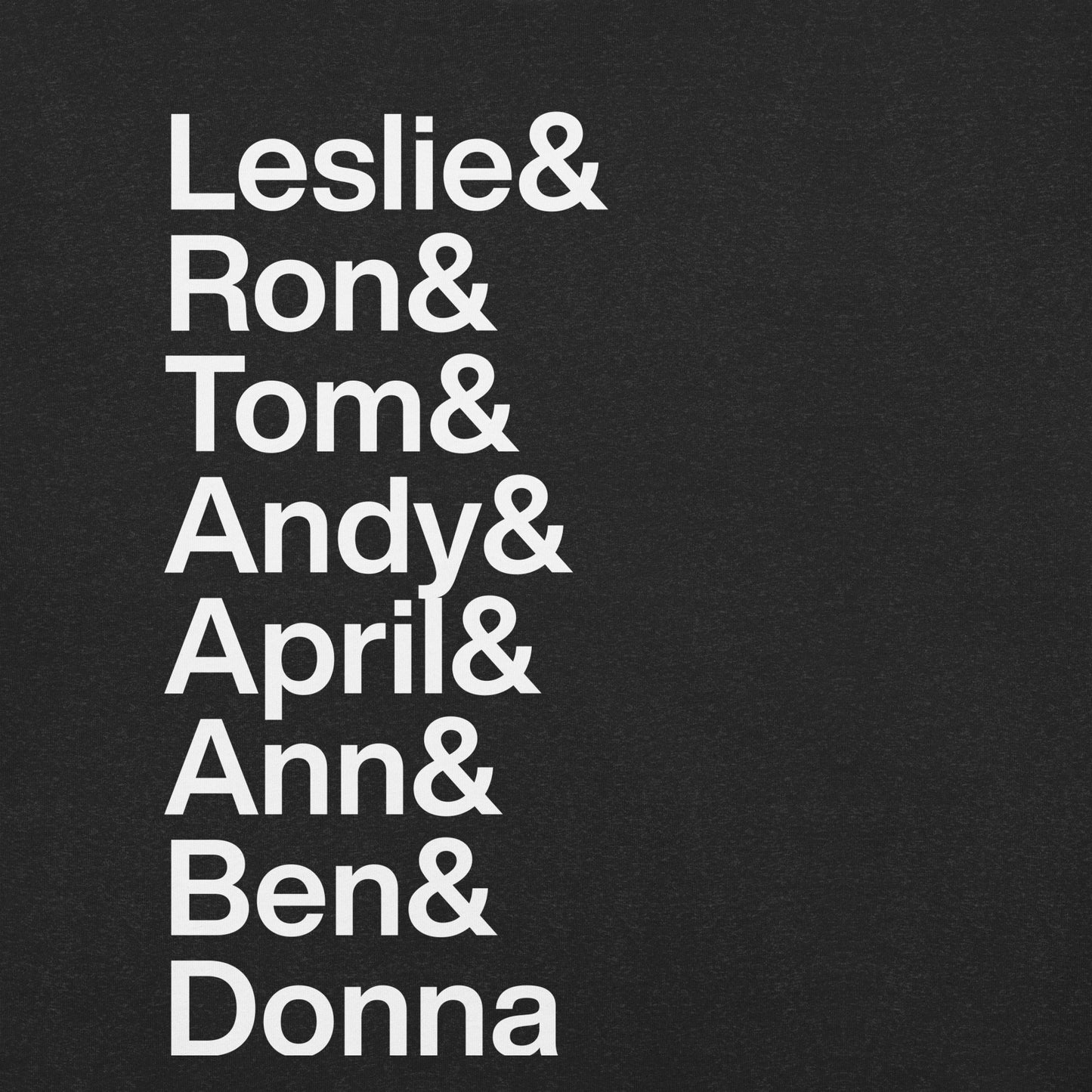 Close up of black t-shirt with white lettering reading Leslie and Ron and Tom and Andy and April and Ann and Ben and Donna