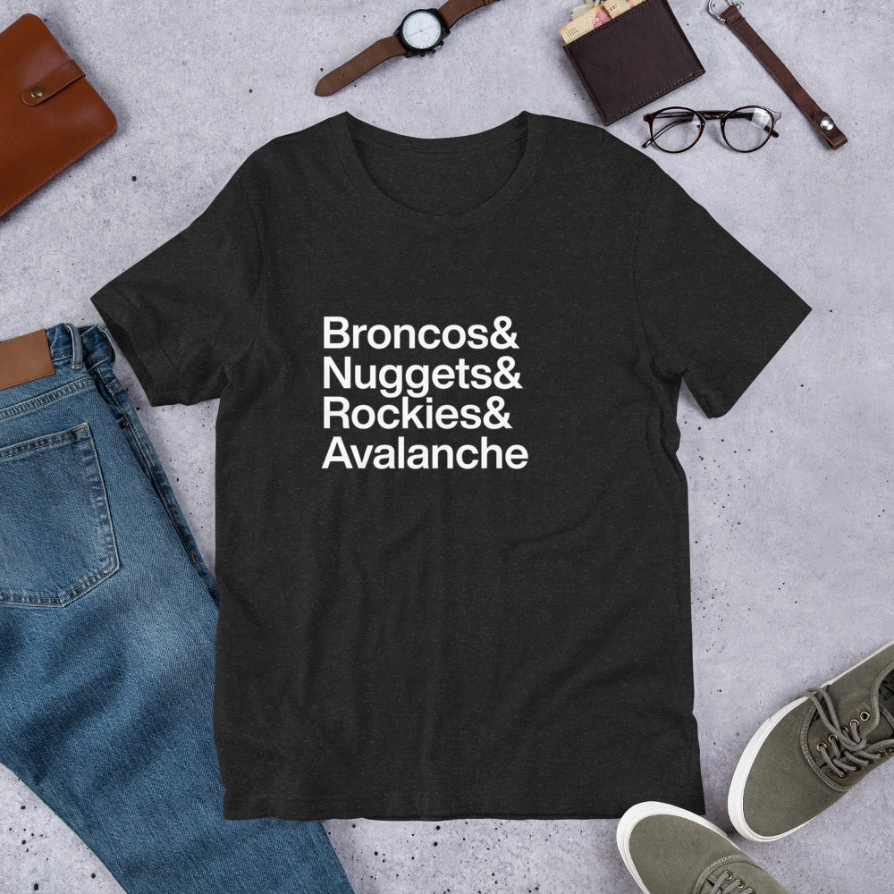 black t-shirt with white lettering reading Broncos and Nuggets and Rockies and Avalanche on ground amidst other apparel