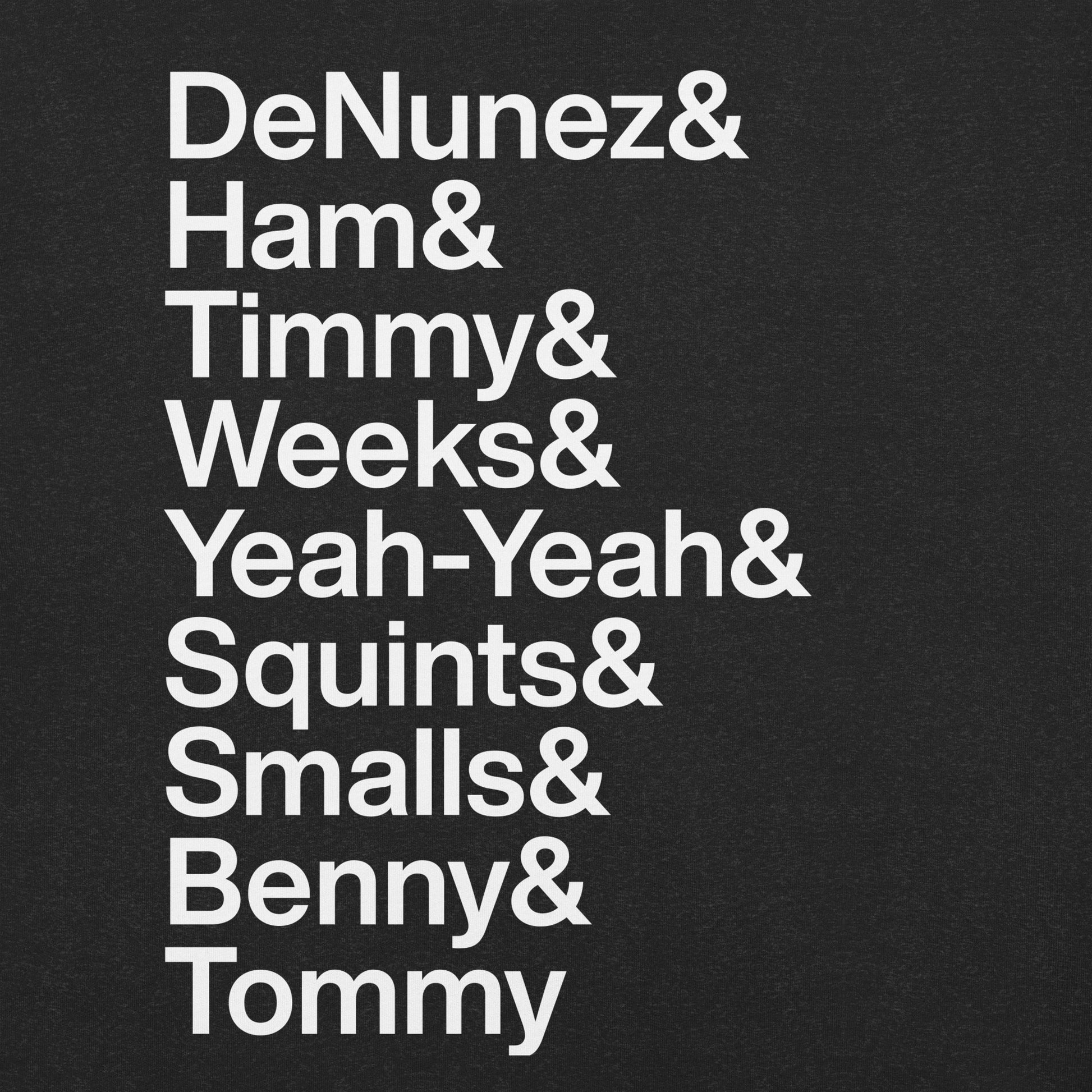 Close up of a black t-shirt with white lettering depicting the characters of the Sandlot