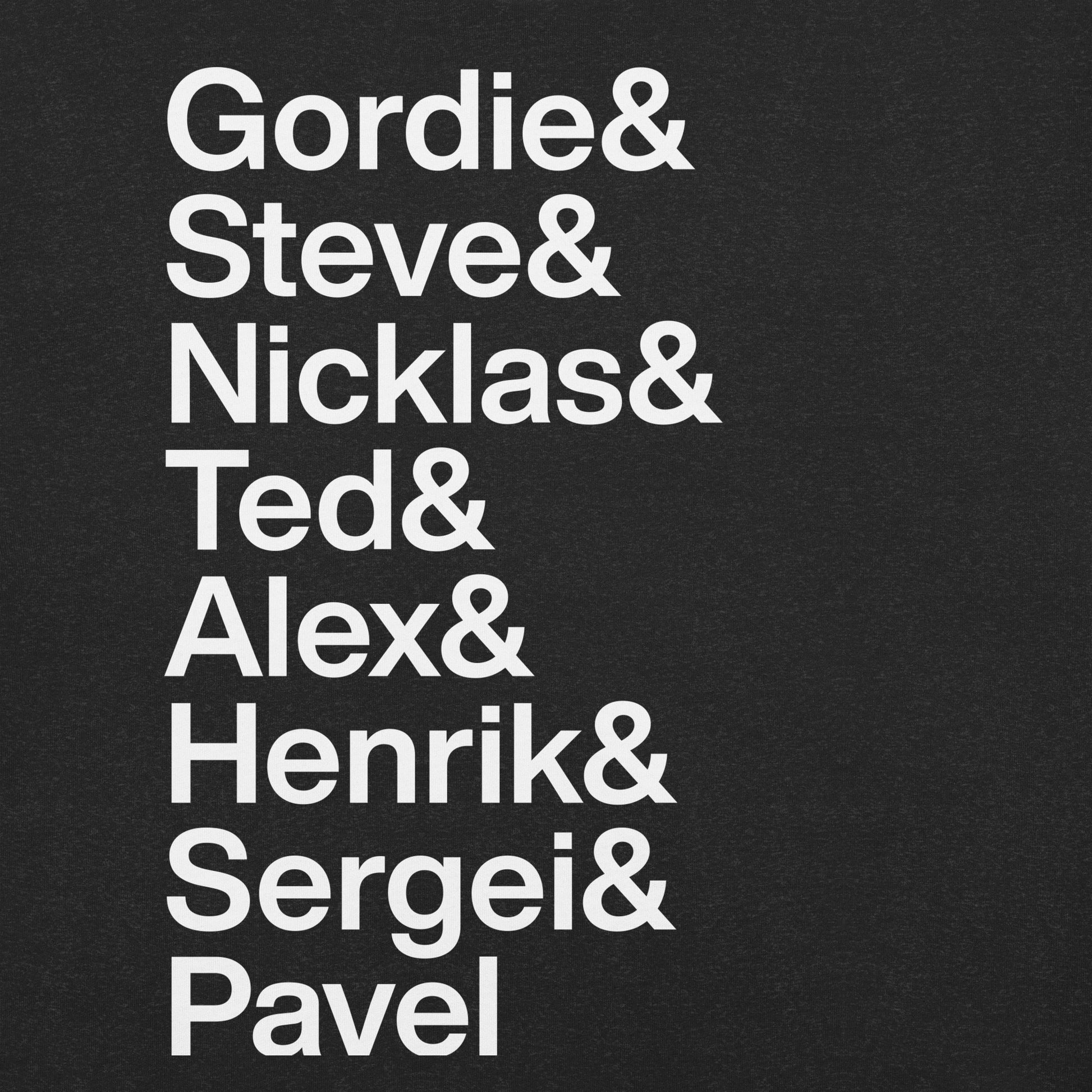 Close up of black t-shirt with white lettering listing GOATs of Red Wings