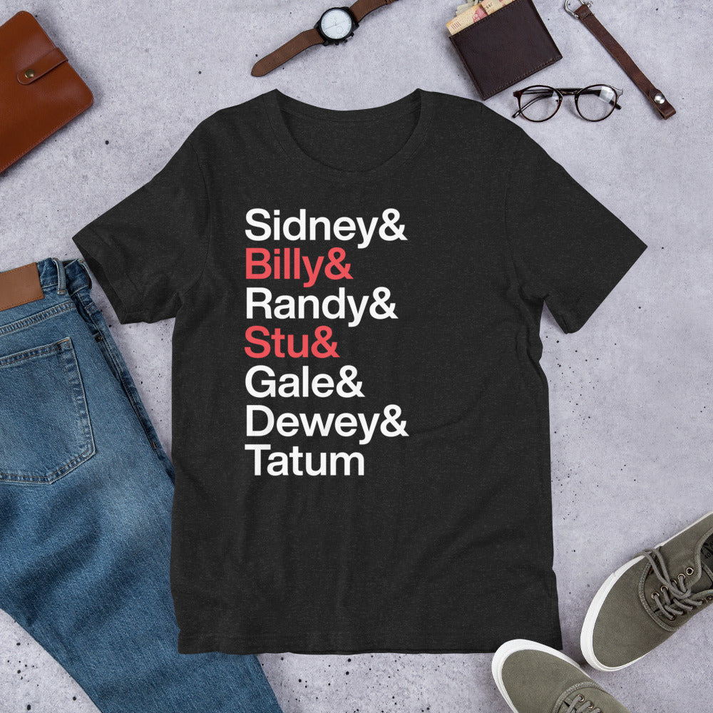 black t-shirt with lettering reading "Sidney and Billy and Randy and Stu and Gale and Dewey and Tatum" where Billy and Stu are highlighted with red lettering on the ground with other clothing items